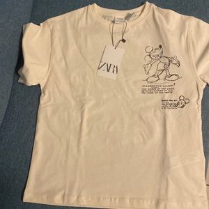 cream color t-shirt size 11-12 years